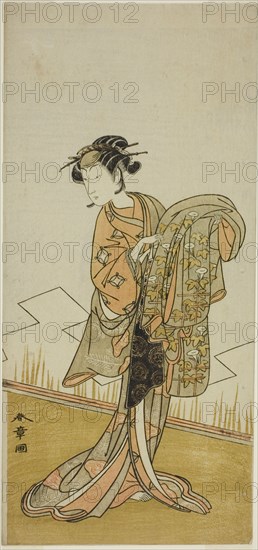 The Actor Nakamura Riko I as the Courtesan Wakamatsu (?) in the Play Gohiiki Kanjincho..., c. 1773. Creator: Shunsho.