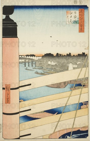 Nihon Bridge and Edo Bridge (Nihonbashi, Edobashi), from the series "One Hundred..., 1857. Creator: Ando Hiroshige.