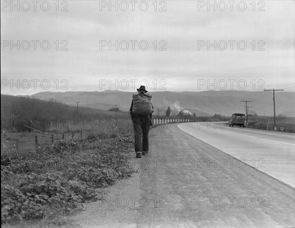 Bum blockade, all heading north, South of King City, California, 1936. Creator: Dorothea Lange.