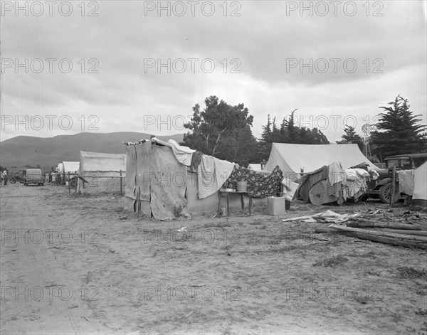 Camps of migrant pea workers, California, 1936. Creator: Dorothea Lange.