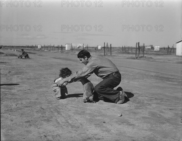 Drought refugees - penniless Oklahomans camped along highway, California, 1936. Creator: Dorothea Lange.