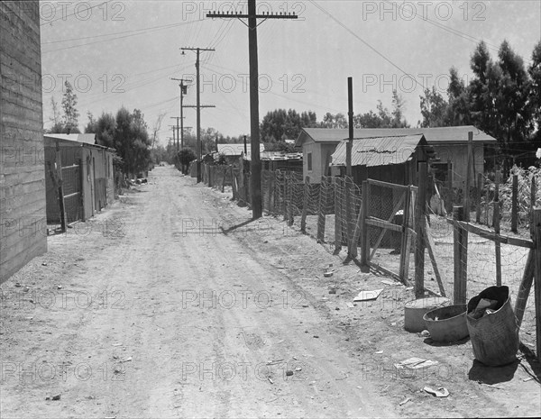 The slums of Brawley, Homes of Mexican field workers, Imperial Valley, California, 1935. Creator: Dorothea Lange.