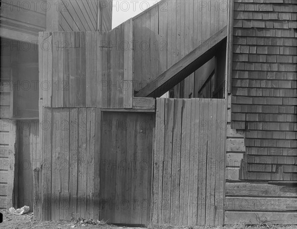 Mission District firetrap, San Francisco, California, 1936. Creator: Dorothea Lange.