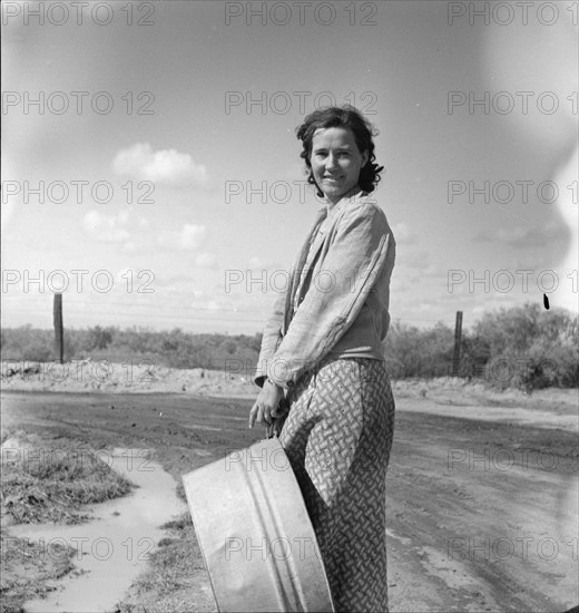 In a migratory camp, California, 1936. Creator: Dorothea Lange.