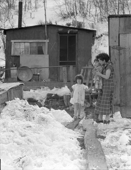 Home and family of a Utah coal miner, Consumers, near Price, Utah, 1936. Creator: Dorothea Lange.