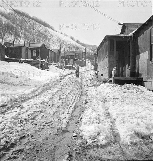 Main street in a Utah coal mining settlement, Consumers, near Price, Utah, 1936. Creator: Dorothea Lange.