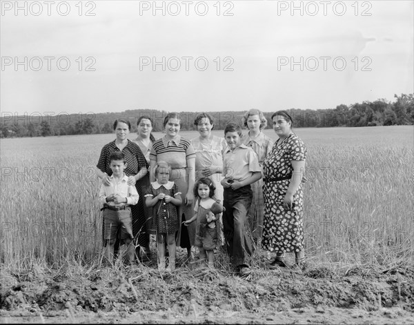 Wives and children of the farm group, Hightstown, New Jersey, 1936. Creator: Dorothea Lange.