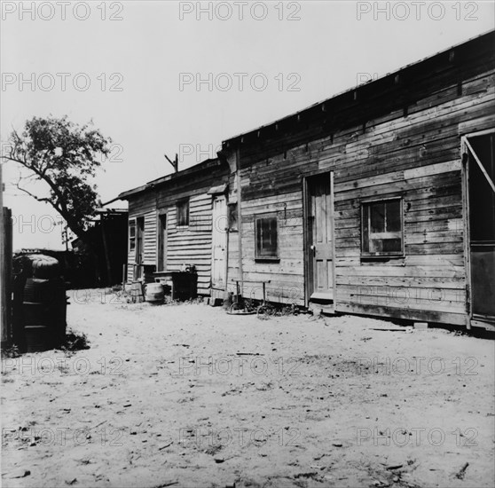 Housing of migrant berry pickers in southern New Jersey, 1936. Creator: Dorothea Lange.