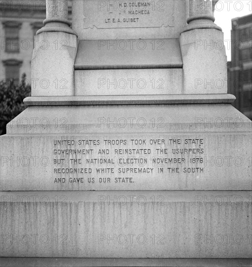 One side of the monument erected to race prejudice, New Orleans, Louisiana, 1936. Creator: Dorothea Lange.