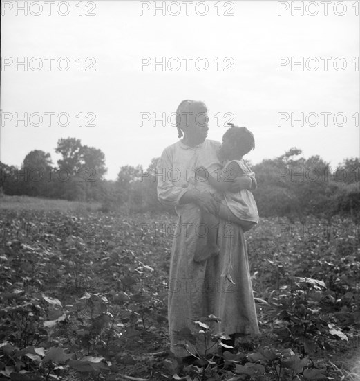 Old time Mississippi Negro living on a cotton patch near Vicksburg, Mississippi, 1936. Creator: Dorothea Lange.