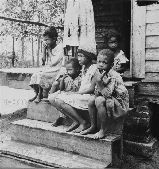 Children of turpentine worker near Cordele, Alabama, 1936. Creator: Dorothea Lange.