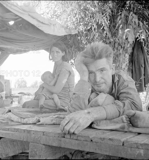 Drought refugees from Oklahoma camping by the roadside, Blythe, California, 1936. Creator: Dorothea Lange.