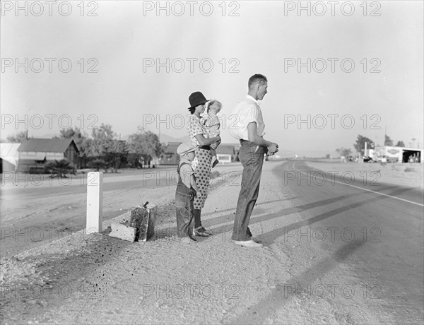 Oklahoma farm family on highway between Blythe and Indio - self-resettlement in California, 1936. Creator: Dorothea Lange.