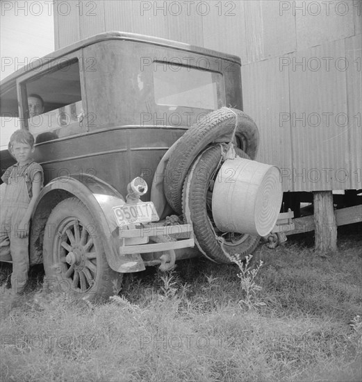 Migrant family's car near Brownsville, Texas, 1936. Creator: Dorothea Lange.