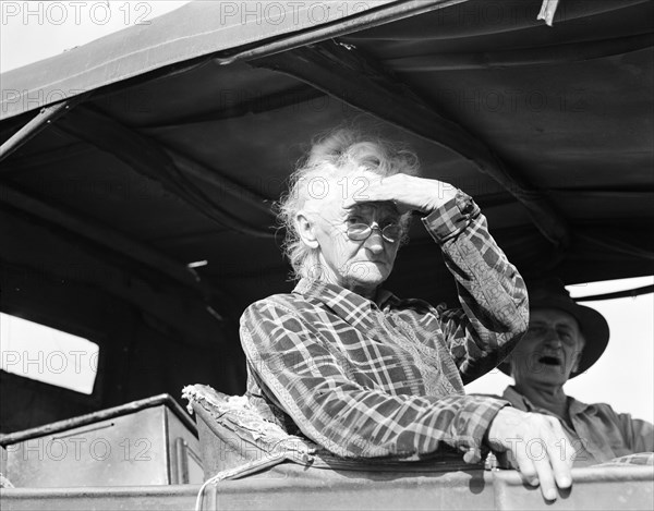 Eighty year old woman living in squatters' camp on the outskirts of Bakersfield, California, 1936. Creator: Dorothea Lange.