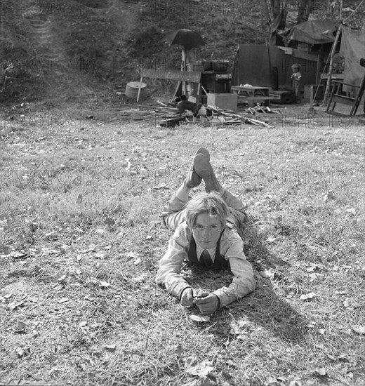 Boy, fourteen, in eighth grade, American River camp, near Sacramento, California, 1936. Creator: Dorothea Lange.