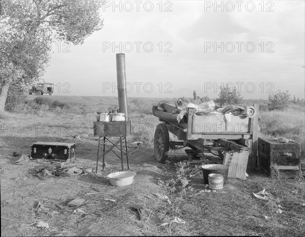 Migratory workers' "kitchen" near Shafter, Kern County, California, 1936. Creator: Dorothea Lange.