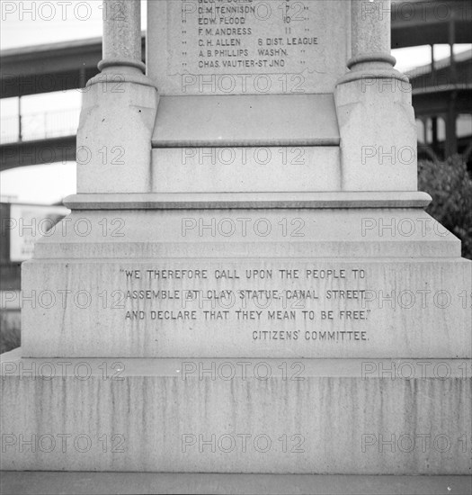 One side of the monument erected to race prejudice, New Orleans, Louisiana, 1936. Creator: Dorothea Lange.