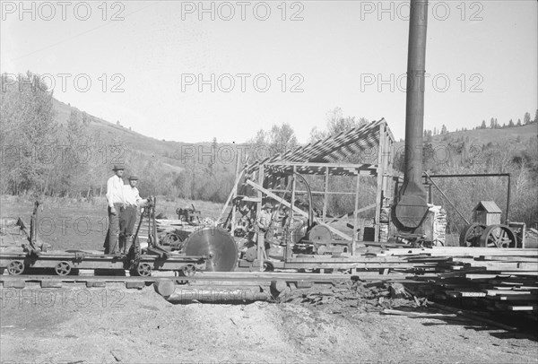 Ola self-help sawmill under construction, Idaho, 1939. Creator: Dorothea Lange.