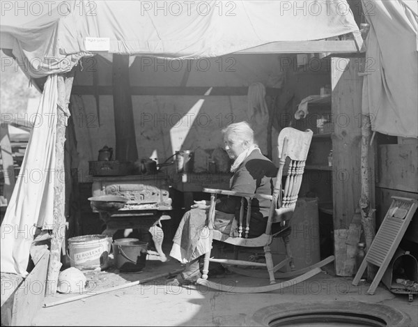 Aged woman from Oklahoma, Kern County migrant camp, California, 1936. Creator: Dorothea Lange.