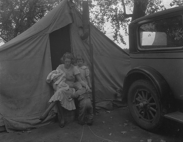 Mother and three children in a California squatter camp, 1936. Creator: Dorothea Lange.