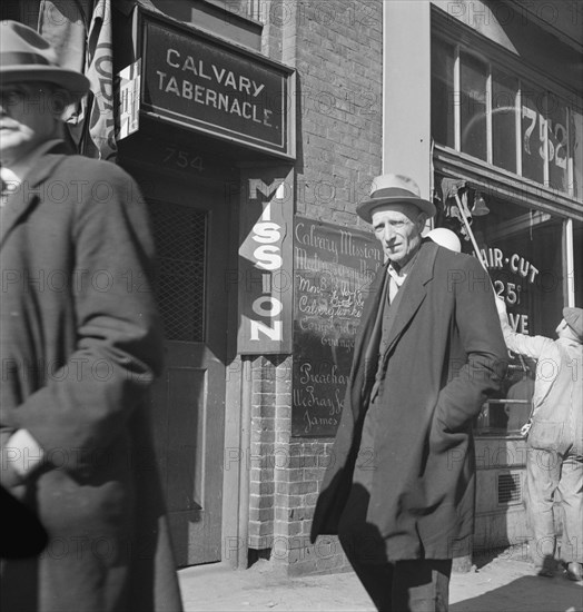 Howard Street, called "Skid Row," the street of the unemployed in San Francisco, California, 1937. Creator: Dorothea Lange.