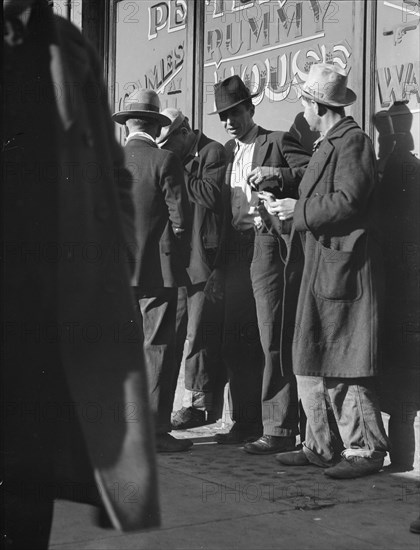 Unemployed men on Howard Street, San Francisco, California, 1937. Creator: Dorothea Lange.