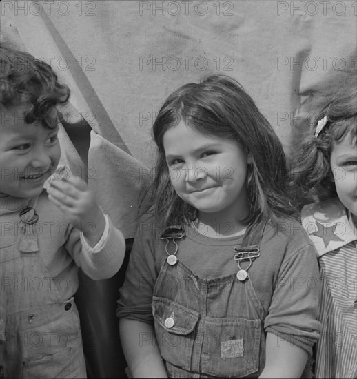 Children of migratory carrot pullers, Mexicans, Imperial Valley, California, 1937. Creator: Dorothea Lange.