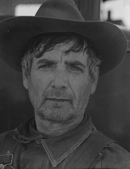 Former tenant farmer from Texas now working in California as a pea picker, Nipomo, California, 1937. Creator: Dorothea Lange.