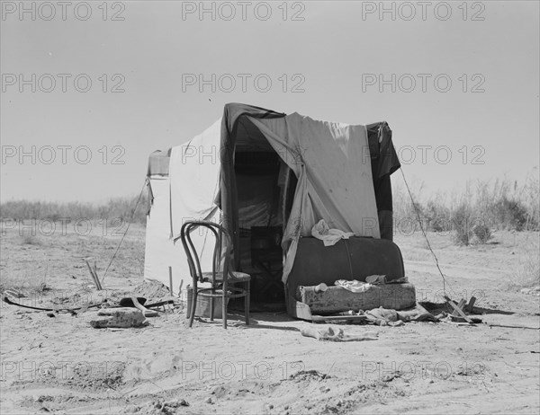 Drought refugees, camp along the roadside, Imperial County, California, 1937. Creator: Dorothea Lange.