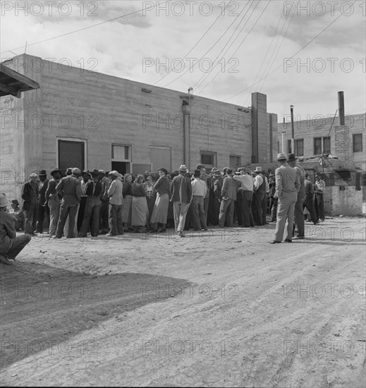 Waiting for the relief checks at Calipatria, California, 1937. Creator: Dorothea Lange.