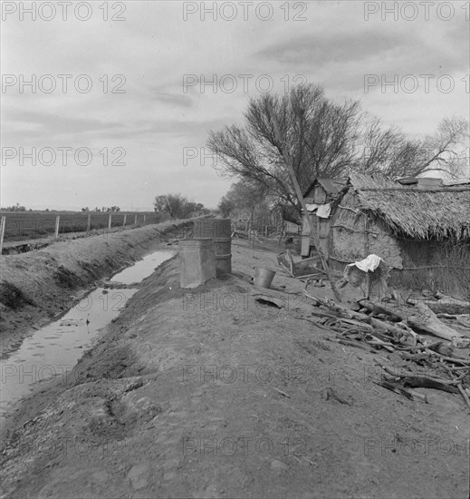 Ditch bank housing for Mexican field workers, Imperial Valley, California, 1937. Creator: Dorothea Lange.