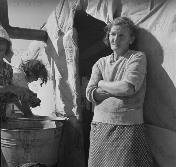 Oklahoma grandmother in southern California squatter's camp, 1937. Creator: Dorothea Lange.