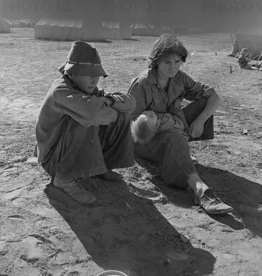 Young Oklahoma mother, age eighteen, penniless, stranded in California, Imperial Valley, 1937. Creator: Dorothea Lange.