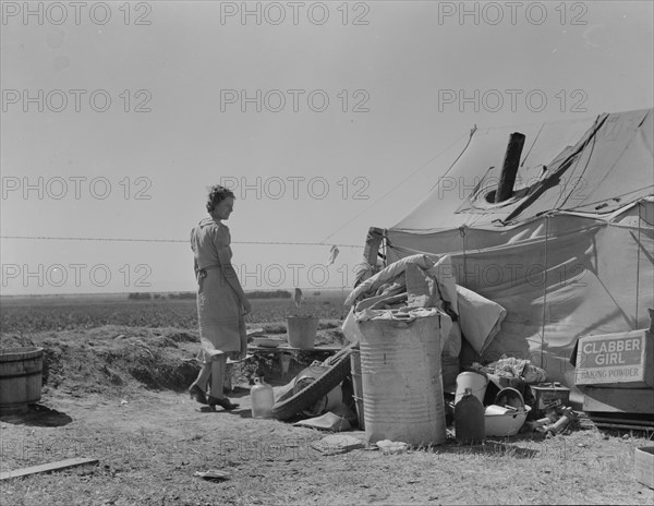 Young family just arrived from Arkansas camped along the road, Imperial Valley, California, 1937. Creator: Dorothea Lange.