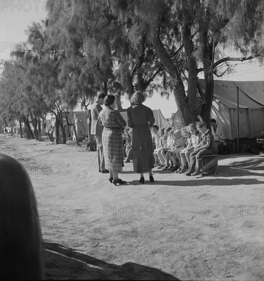 Sunday school for migrant children in a potato pickers' camp, Kern County, California, 1937. Creator: Dorothea Lange.