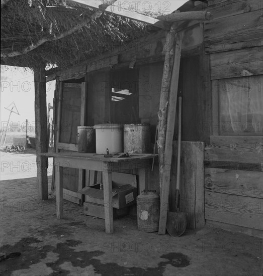 Porch of Mexican worker's home in East El Centro, Imperial Valley, California, 1937. Creator: Dorothea Lange.