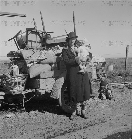 Missouri family of five, seven months from the drought area, 1937. Creator: Dorothea Lange.