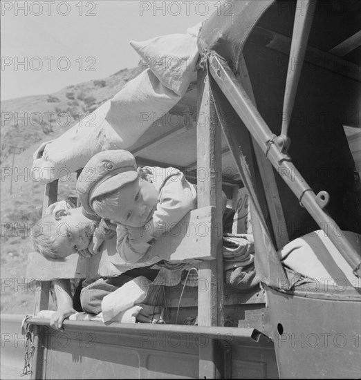 Drought refugee children on US99 near Bakersfield, California, 1937. Creator: Dorothea Lange.