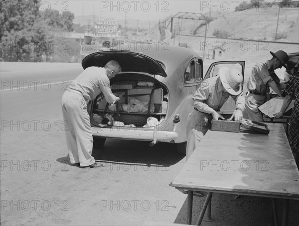 Inspection station on the California-Arizona state line maintained by..., 1937. Creator: Dorothea Lange.