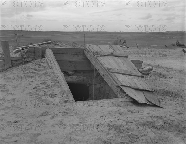 Storm cellar on the Texas plains, West Texas Panhandle, 1937. Creator: Dorothea Lange.