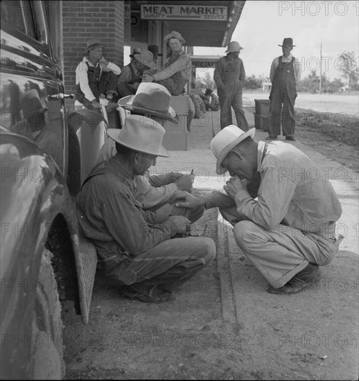 Dust bowl farmers of west Texas in town, 1937. Creator: Dorothea Lange.