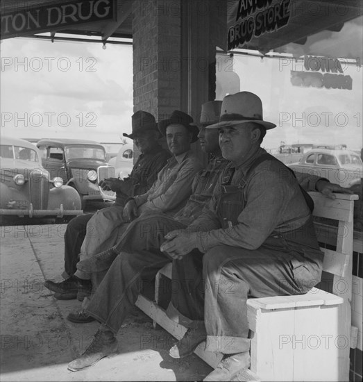 Dust bowl farmers of west Texas in town, 1937. Creator: Dorothea Lange.