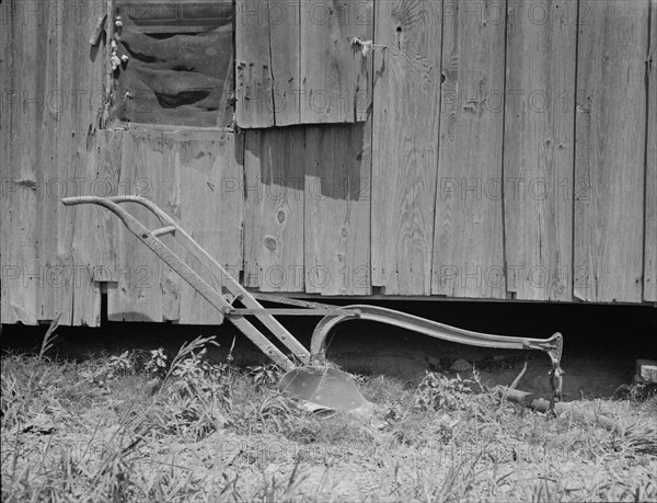 Sharecropper's cabin and sharecropper's tool, Mississippi, 1937. Creator: Dorothea Lange.
