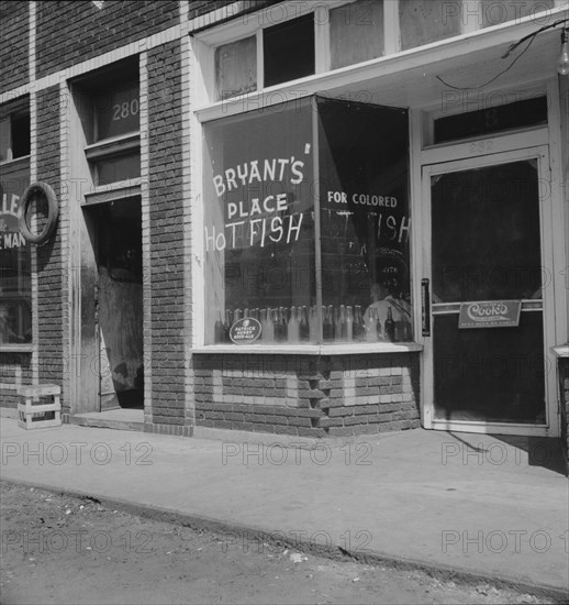 Fish restaurant for colored in the quarter cotton hoers are recruited, Memphis, Tennessee, 1937. Creator: Dorothea Lange.