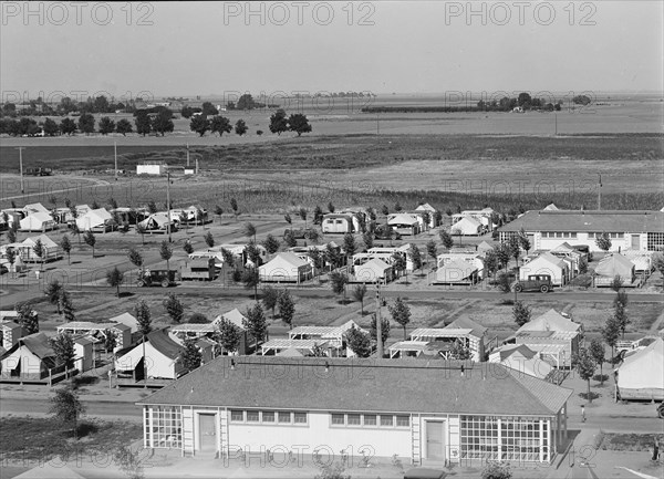 Farm Security Administration camp for migrant agricultural workers at Shafter, California, 1938. Creator: Dorothea Lange.