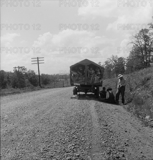 On highway no. 1 of the "OK" state near Webbers Falls, Muskogee County, Oklahoma, 1938. Creator: Dorothea Lange.