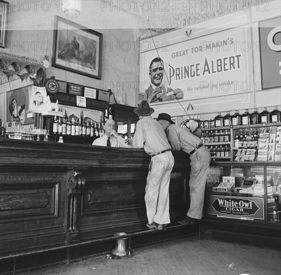 Original bar of "Helldorado", Crystal Palace Saloon, Tombstone, Arizona, 1938. Creator: Dorothea Lange.