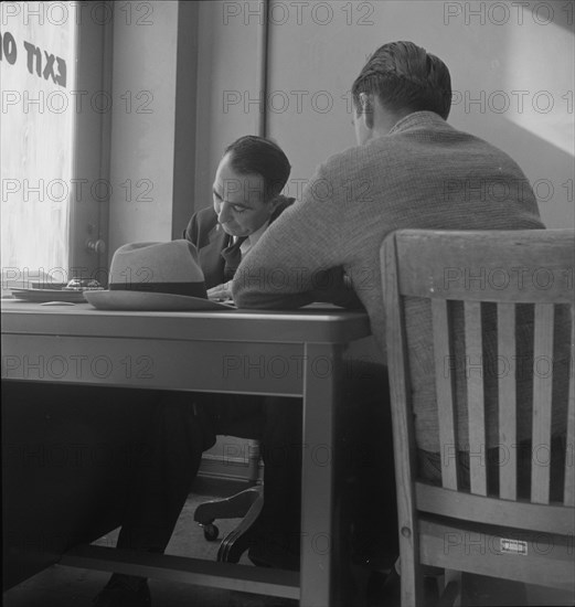 The interview for unemployment compensation, San Francisco, California, 1938. Creator: Dorothea Lange.