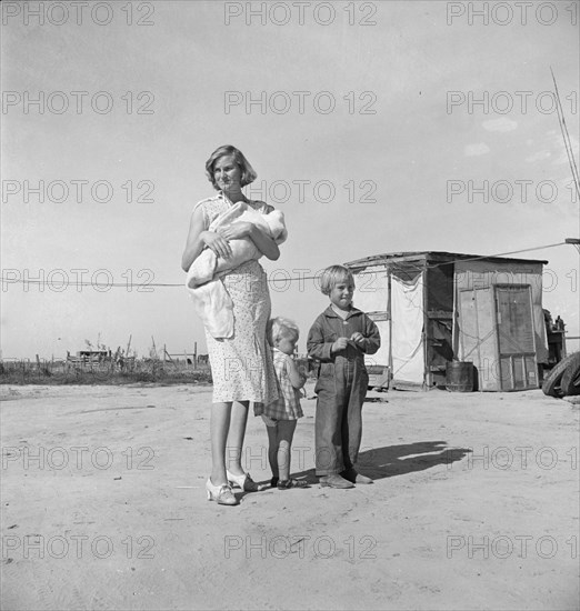 Family of rural rehabilitation client, Tulare County, California, 1938. Creator: Dorothea Lange.